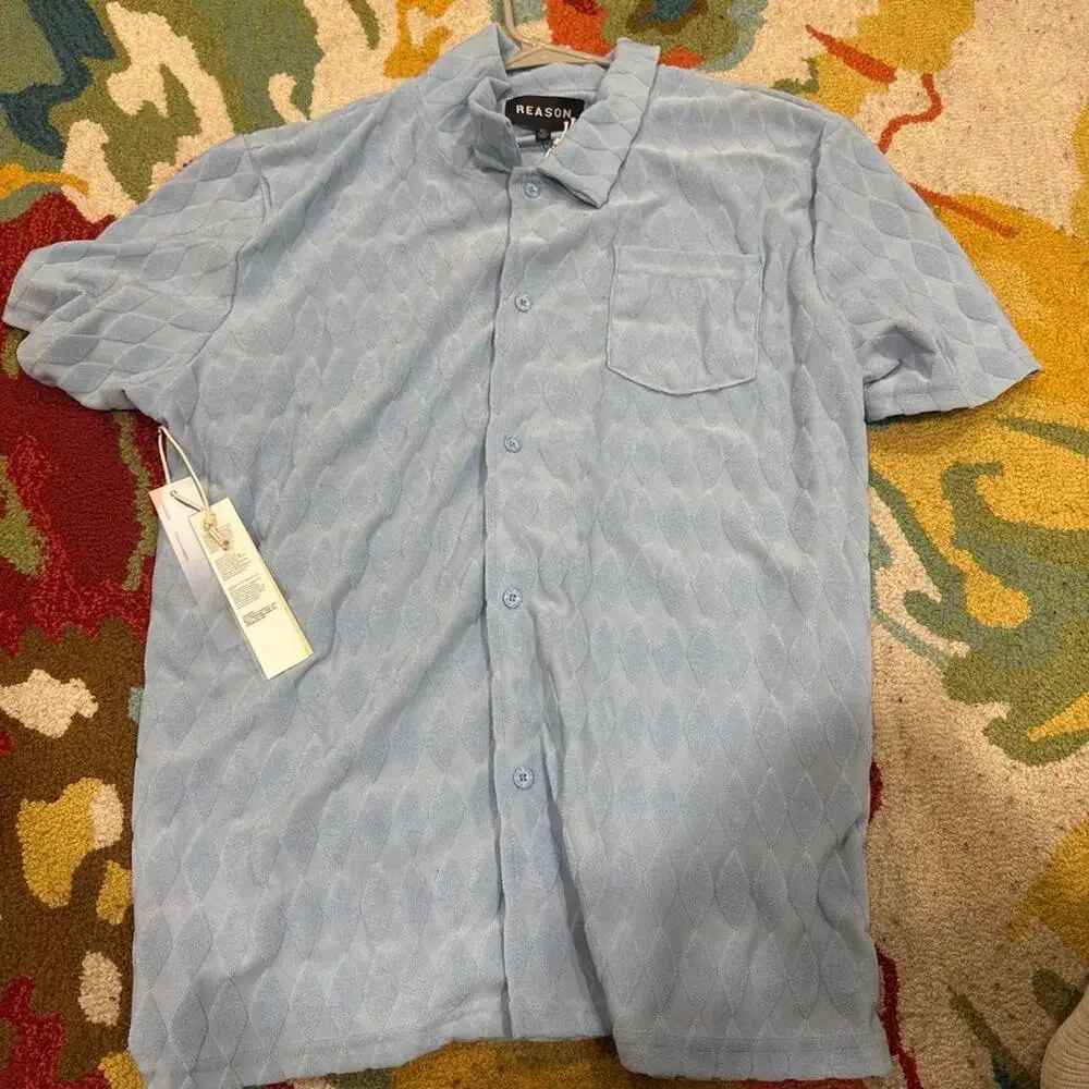 Blue button up shirt with diamond